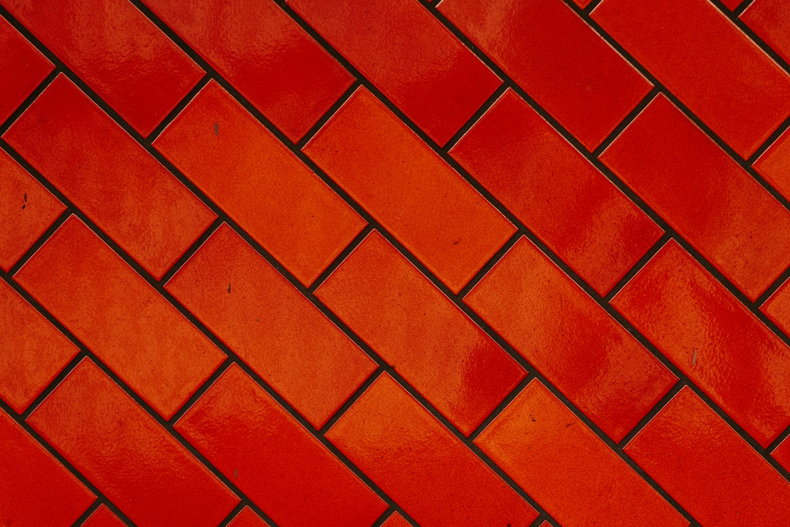 Close-up of a vibrant blue mosaic tile pattern, perfect for design and texture applications.